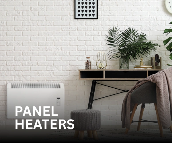 Elnur PH PLUS panel heater installed on a wall, with a desk beside it. The text 'Panel Heaters' is in front of it.