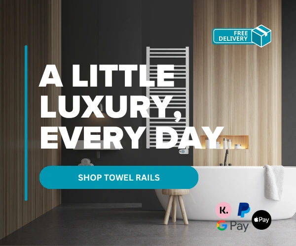 A white towel rail installed in a bathroom, just above a bath, with the text "A little luxury, every day".